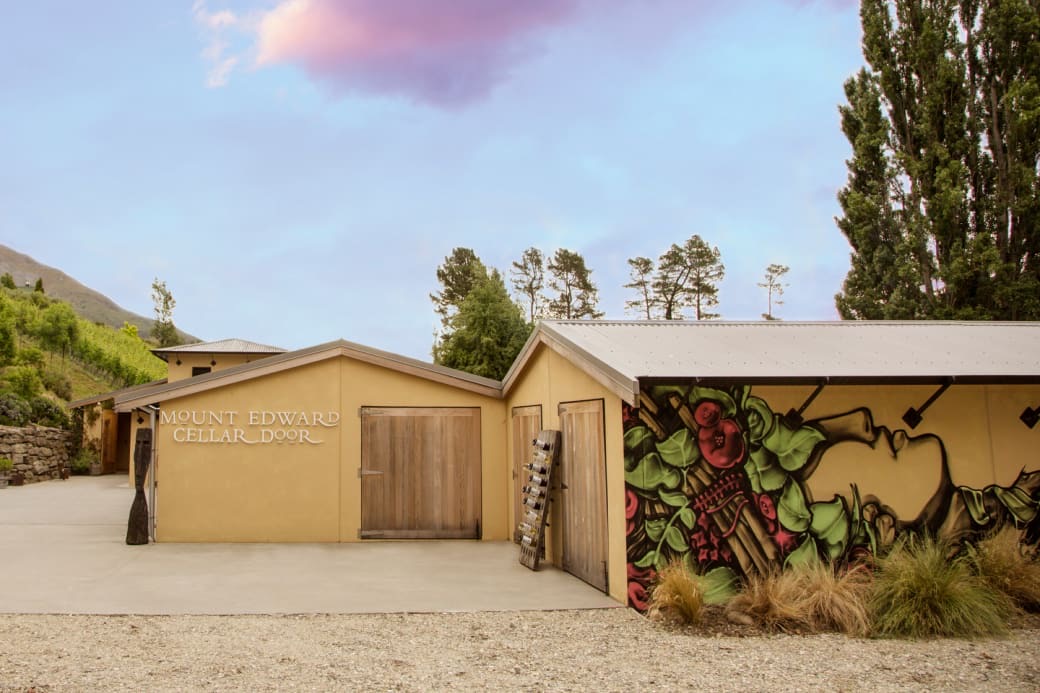 The Mt Edward cellar door, a small building among the vines